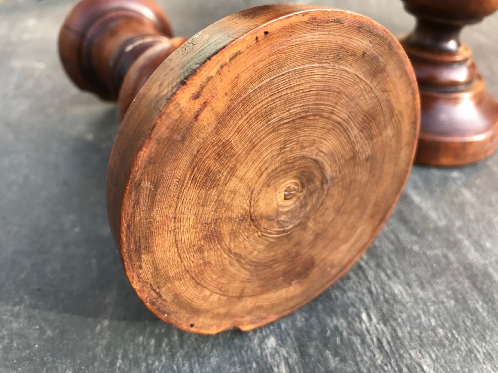 A Pair of  Georgian Yew Wood Candlesticks View III