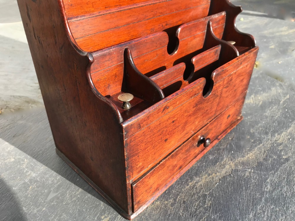 An early to mid 19th century stationery rack  View V