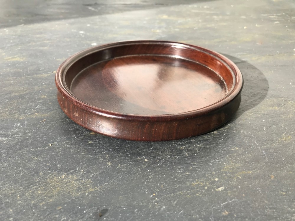 A fine early 19th century mahogany wine coaster  View III