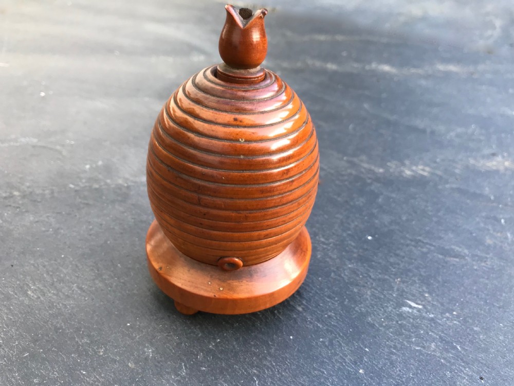 A lovely mid 19th century box wood string/thread/twine holder in the shape of a bee hive