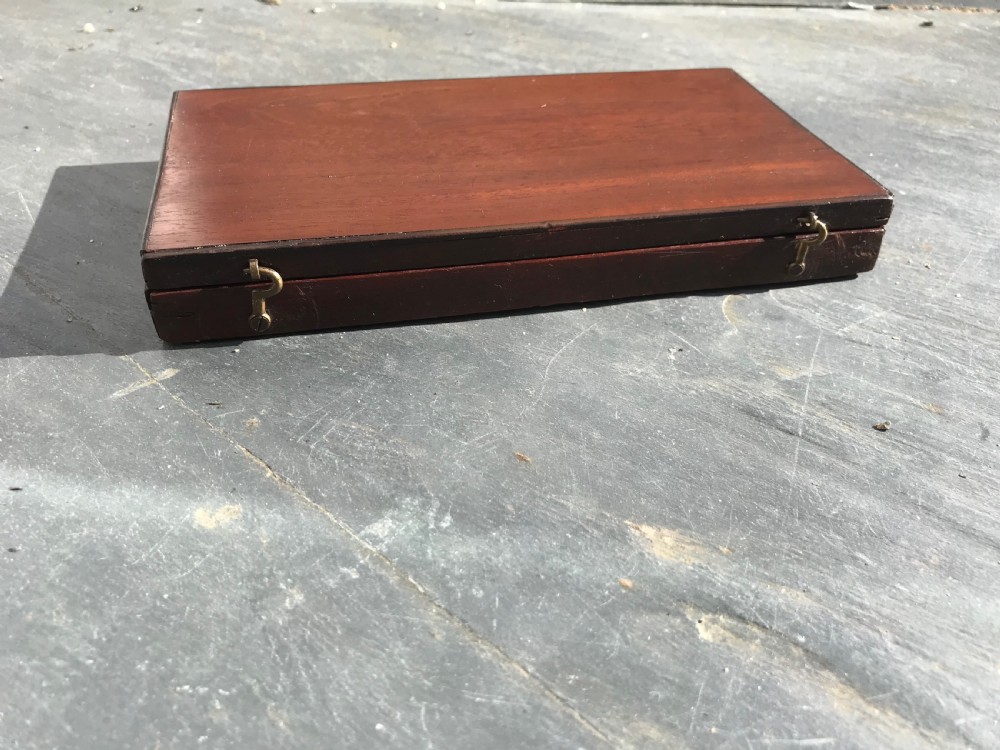 A 19th century mahogany boxed set of bone alphabet tiles View IV