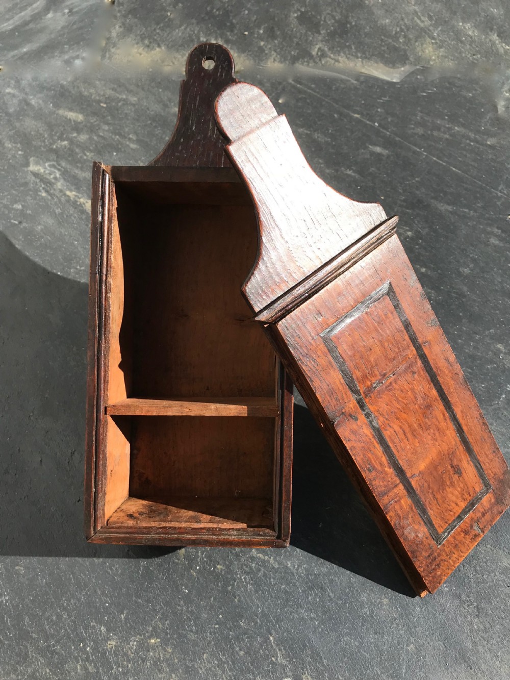 A Georgian oak tinder box with inlaid lid and lovely burr oak sides.