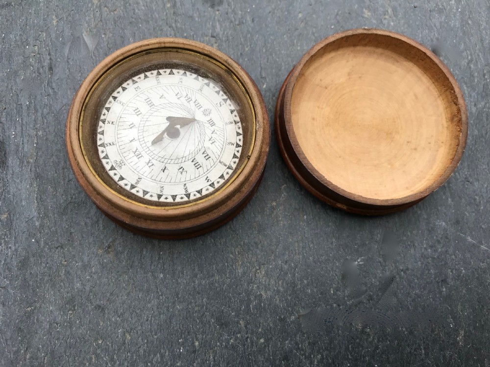 An Antique Sundial and Compass