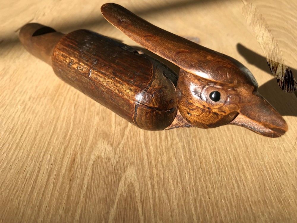 An early 20th century carved bird call