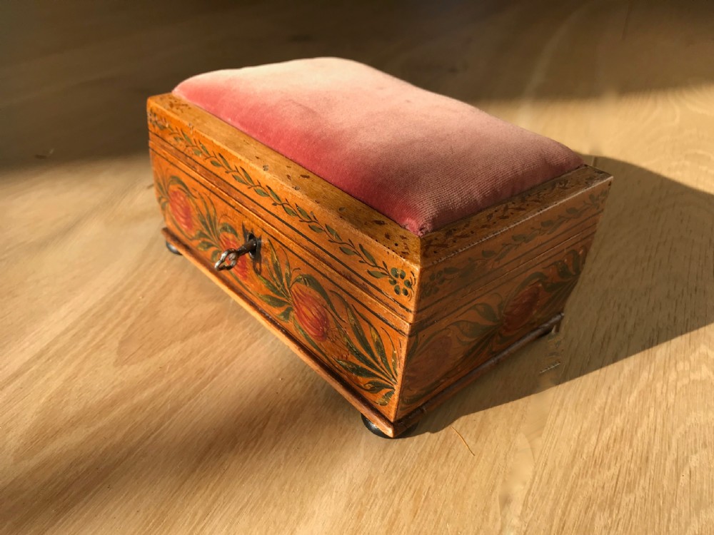 An early 1800's painted sewing box