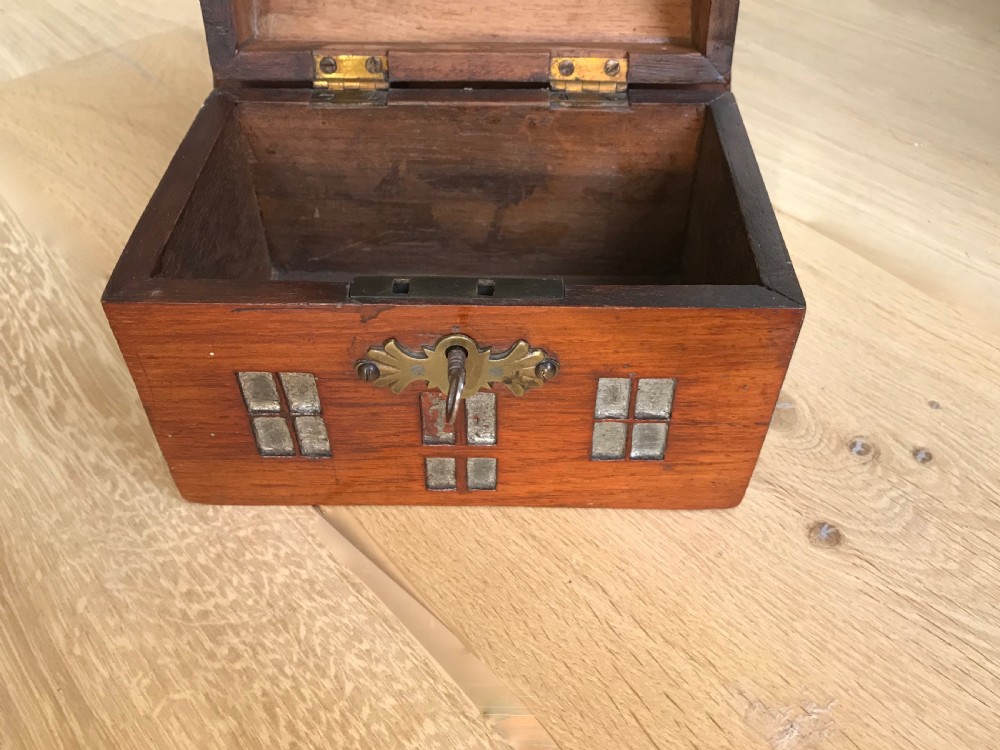 An unusual mahogany money box in the shape of a house - treen View II