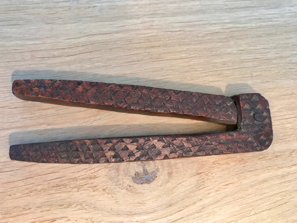 An antique treen English lever nutcracker dated 1791  View V
