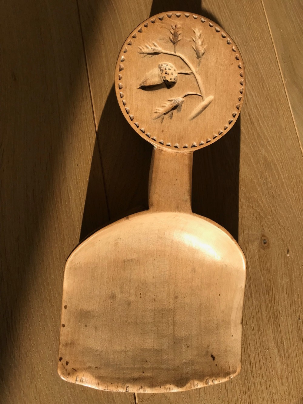 A rare Welsh sycamore scoop or spade with a double sided butter stamp
