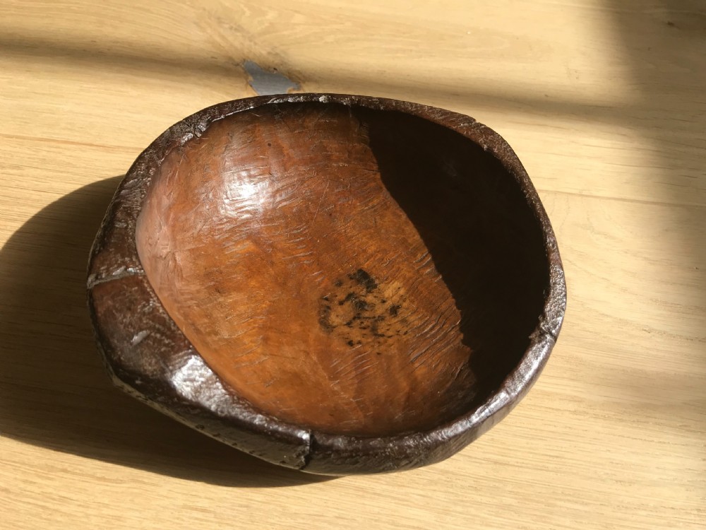 A small primitive 18th century treen bowl 