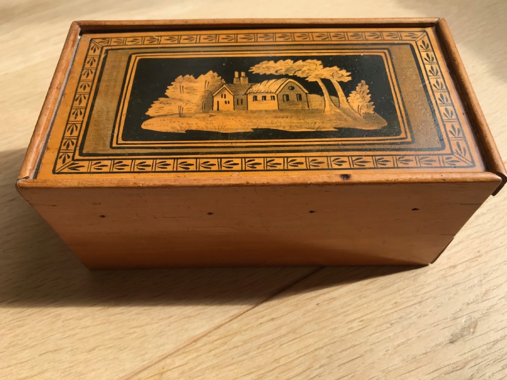 An early 1800's whitewood reel box