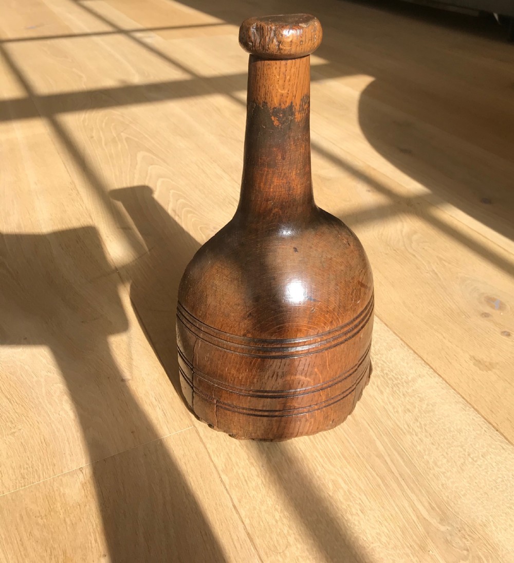 A Georgian Door Stop - shape of wine bottle