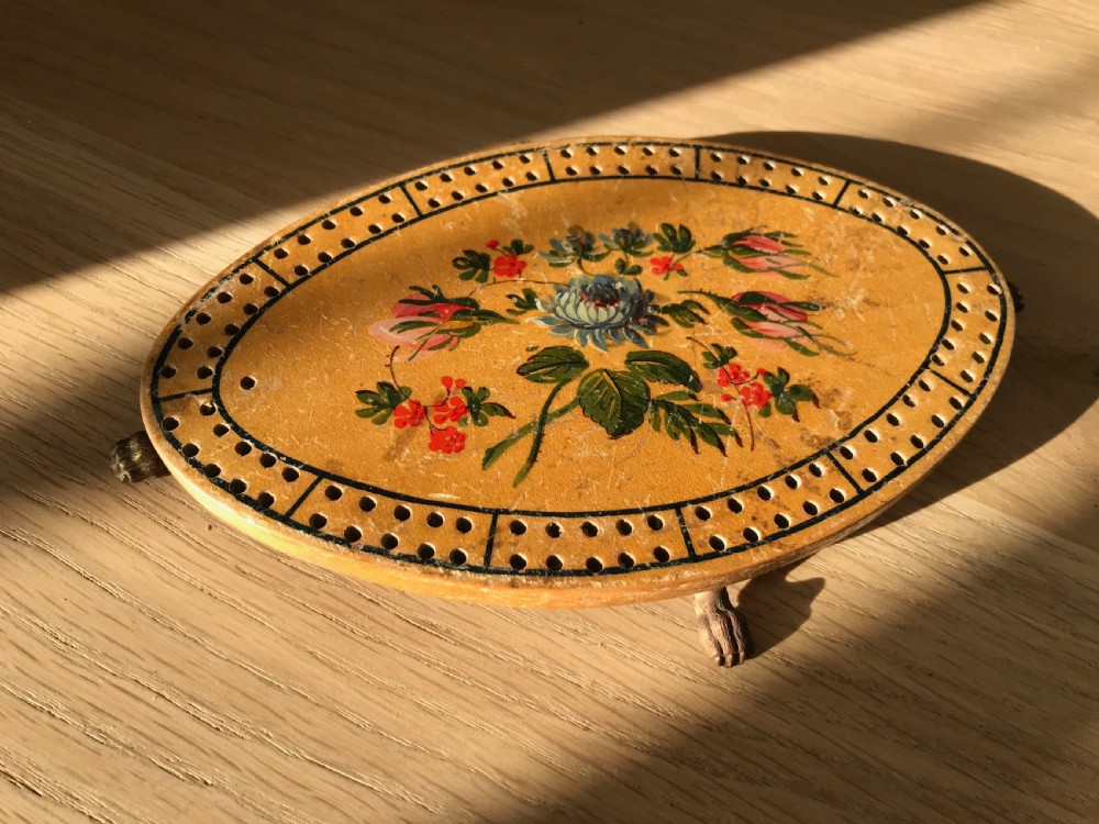 An early 1800's whitewood cribbage board 