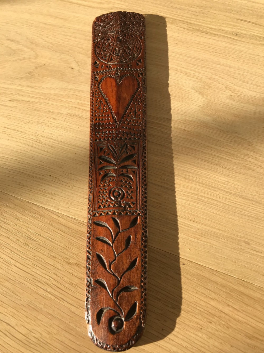 An Antique Treen Stay Busk- chip carved decoration