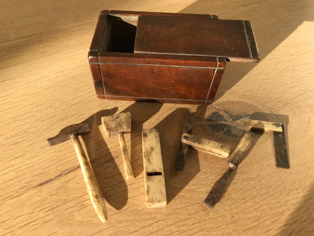 An Antique Box with Miniature Carpentry Tools