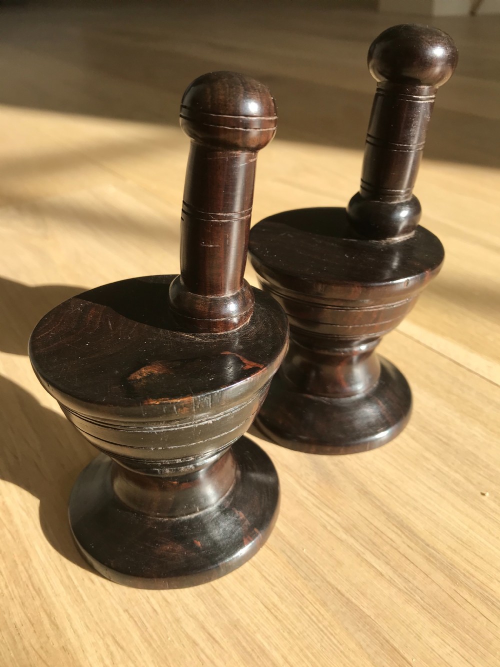 A rare pair of antique treen window stops