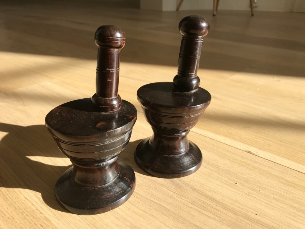 A rare pair of antique treen window stops View II
