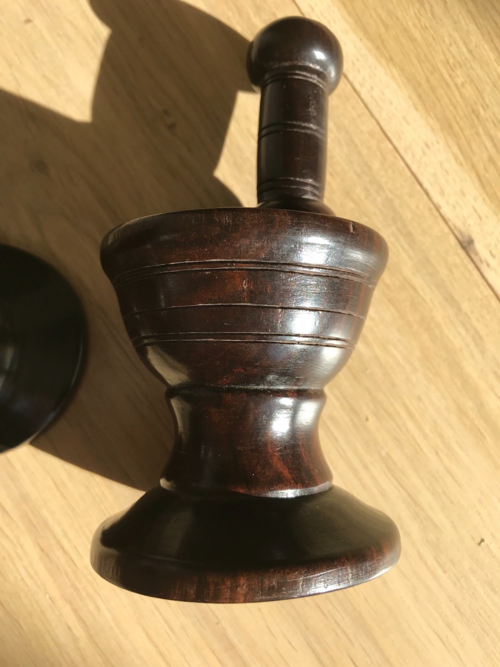 A rare pair of antique treen window stops View V