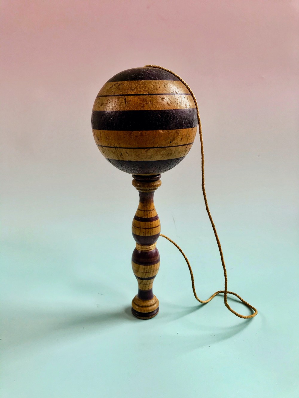 An Antique Painted Bilboquet - good size