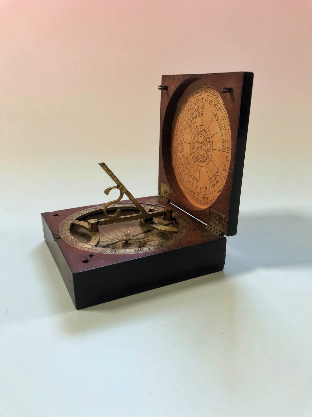 A Georgian Sun Dial & Compass -signed with makers name