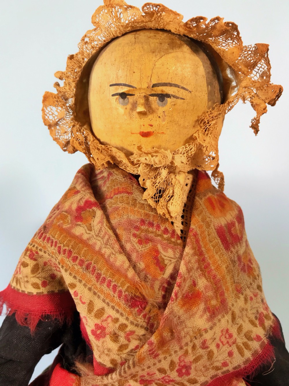 A Large Grodnertal Type Doll - in old clothes View II