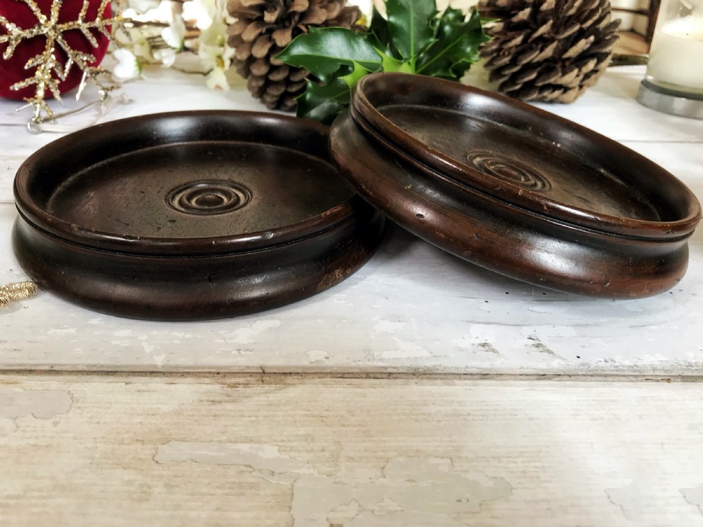 A Pair of Georgian Mahogany Wine Coasters