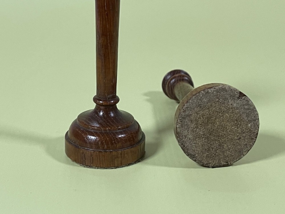 A Pair of Antique Taper Candlesticks View II