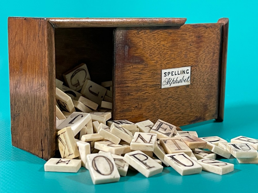Antique Alphabet & Spelling Box - with 118 bone alphabet letters
 