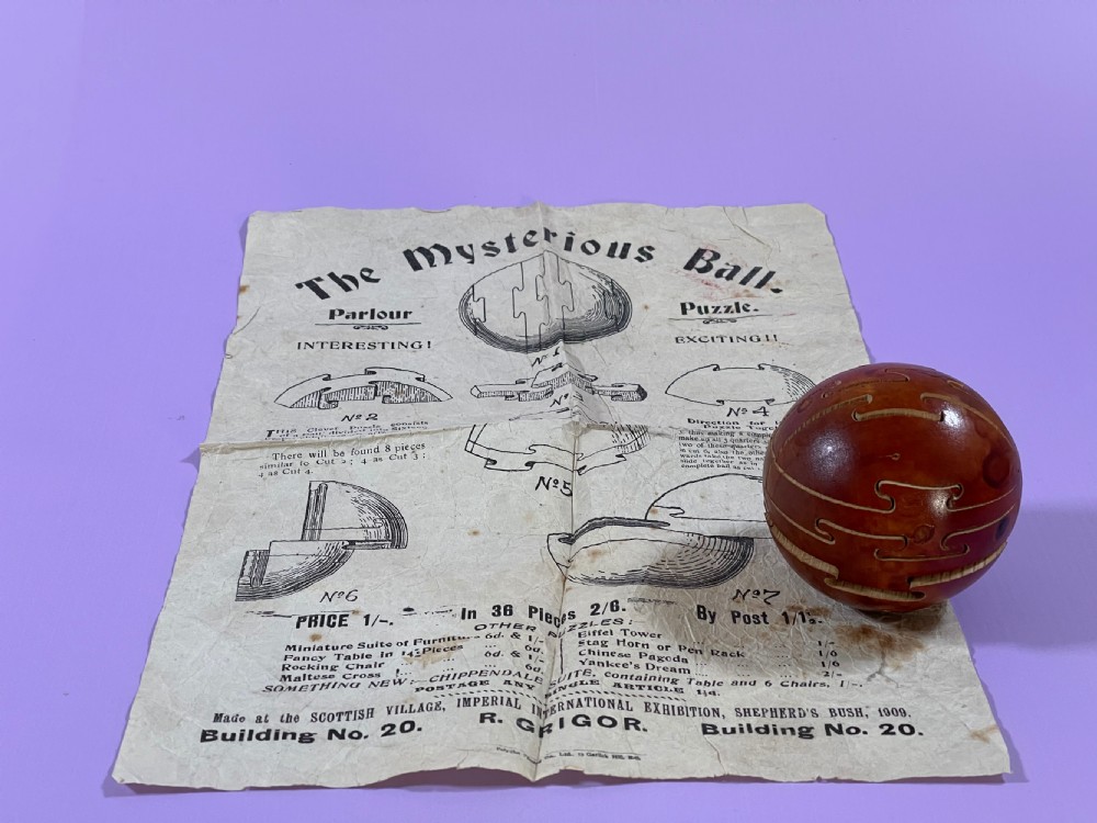 Antique Puzzle Ball - with original paper solution View VII