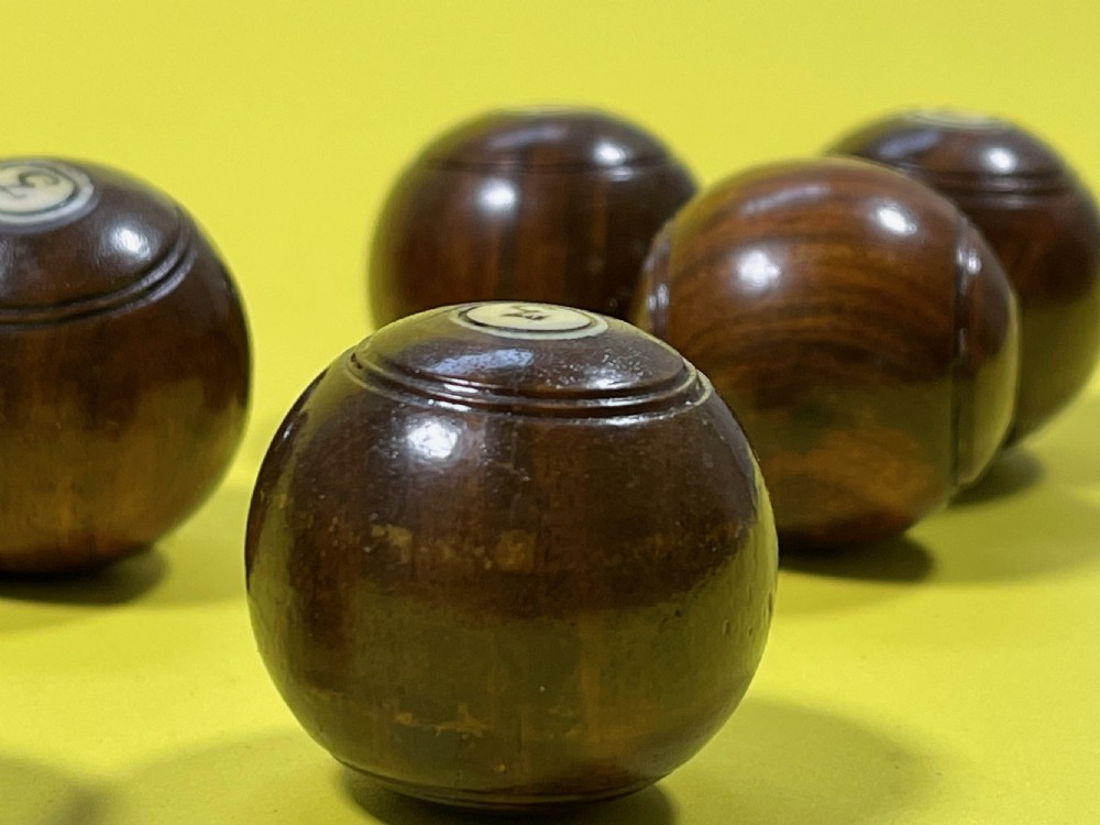 A Complete Set of Mini Lignum Vitae Bowls & Jack View III