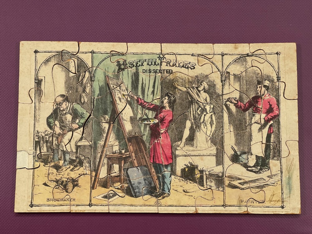 An Unusual Double Sided Dissected Puzzle - titled Useful Trades