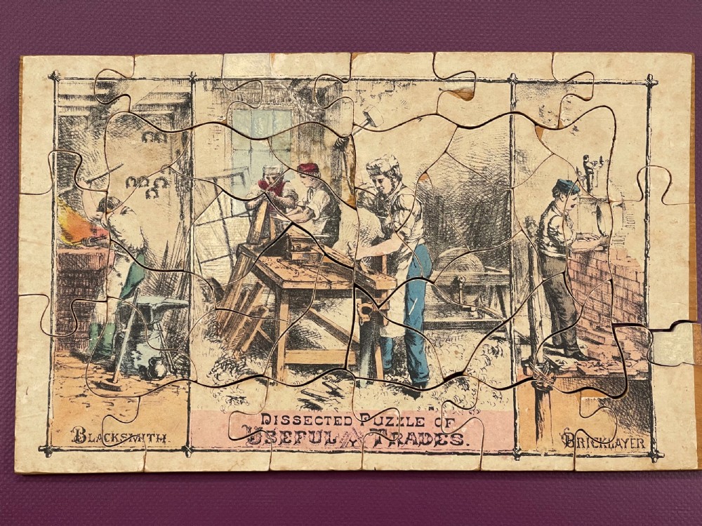 An Unusual Double Sided Dissected Puzzle - titled Useful Trades View II