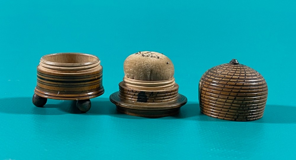 An early 1800s  painted Tunbridge Ware pin poppet and storage box in the form of a bee skep View II