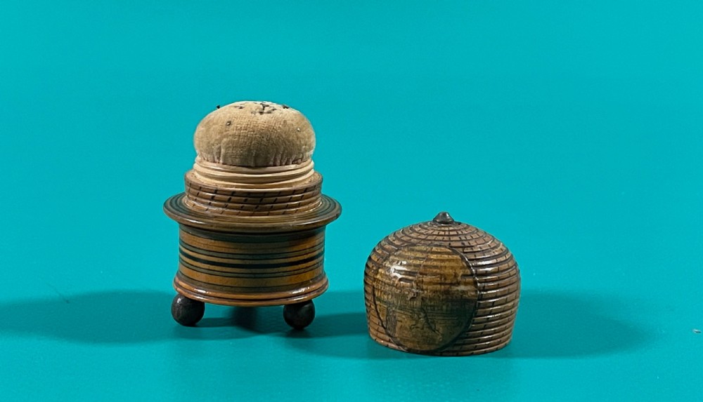 An early 1800s  painted Tunbridge Ware pin poppet and storage box in the form of a bee skep View III