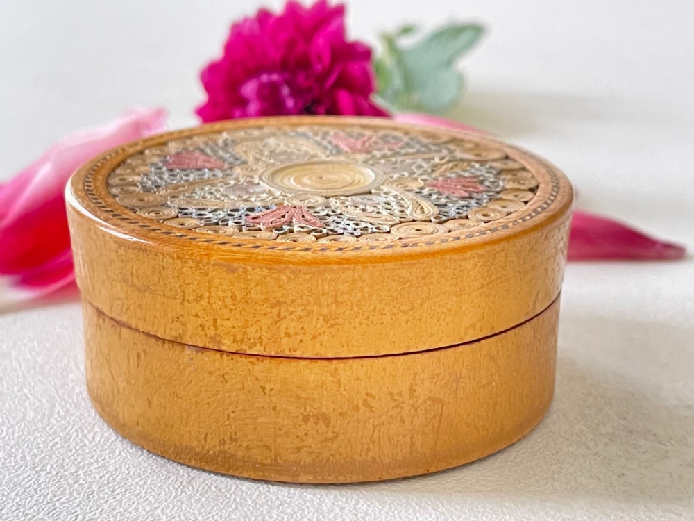 A Georgian circular box decorated with rolled paper. View II