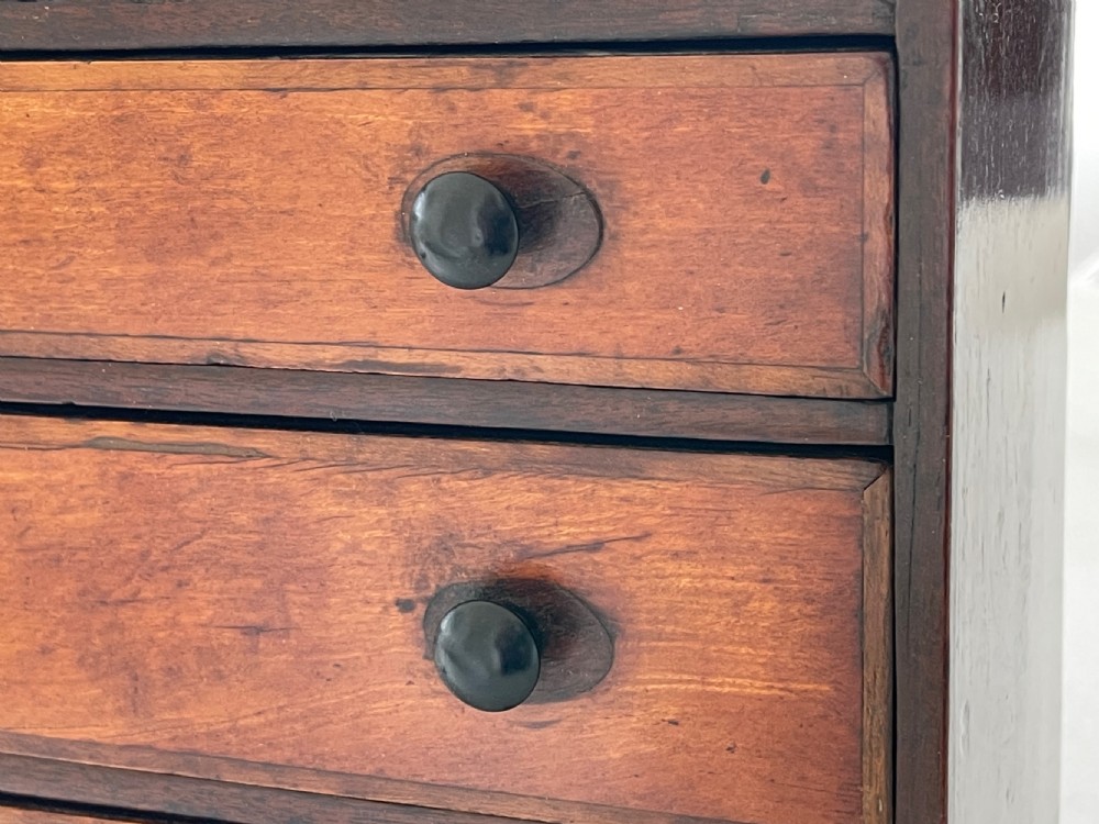 An Early 1800s Mini Chest of Drawers - fruitwood View III