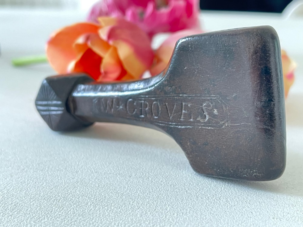 A very good antique treen sailor's rubber - faceted handle View III