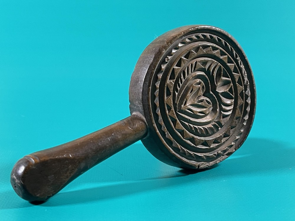 An Antique Treen Lollipop Butter Stamp & Slapper View VII