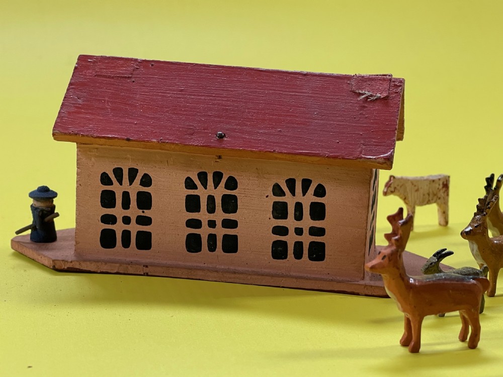 A Small Folk Art Noahs Ark - with a mixture of 19 animals