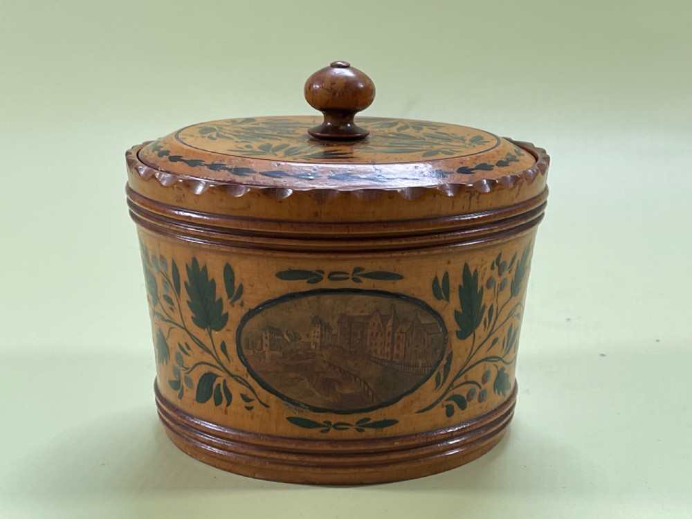 An early Tunbridge Ware painted circular sewing box