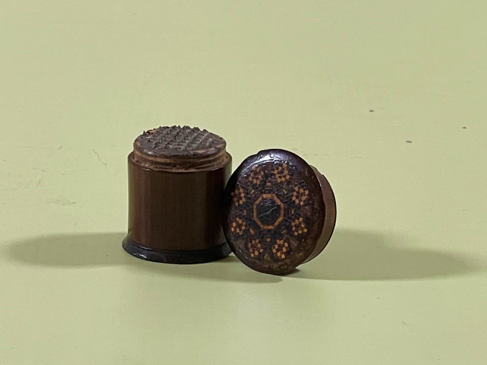 An antique  treen Tunbridge Ware nutmeg grater. 