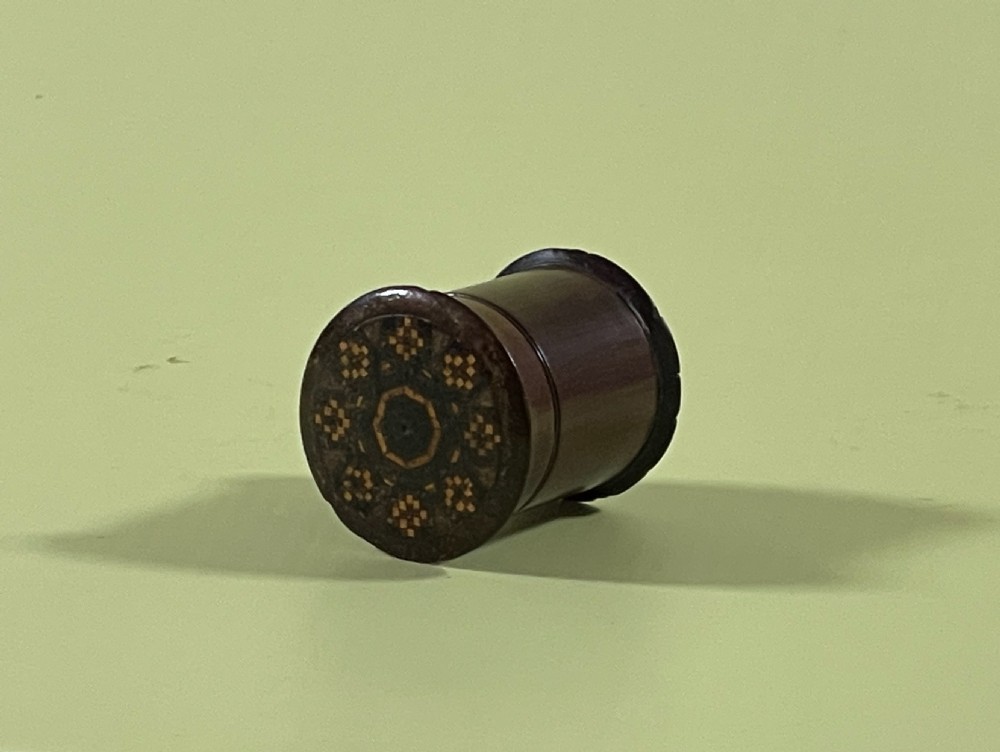 An antique  treen Tunbridge Ware nutmeg grater.  View V