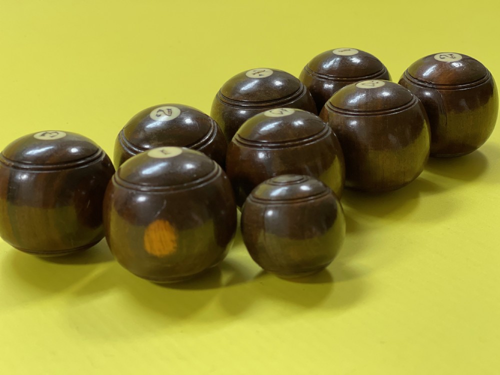A Set of mini indoor carpet bowls
