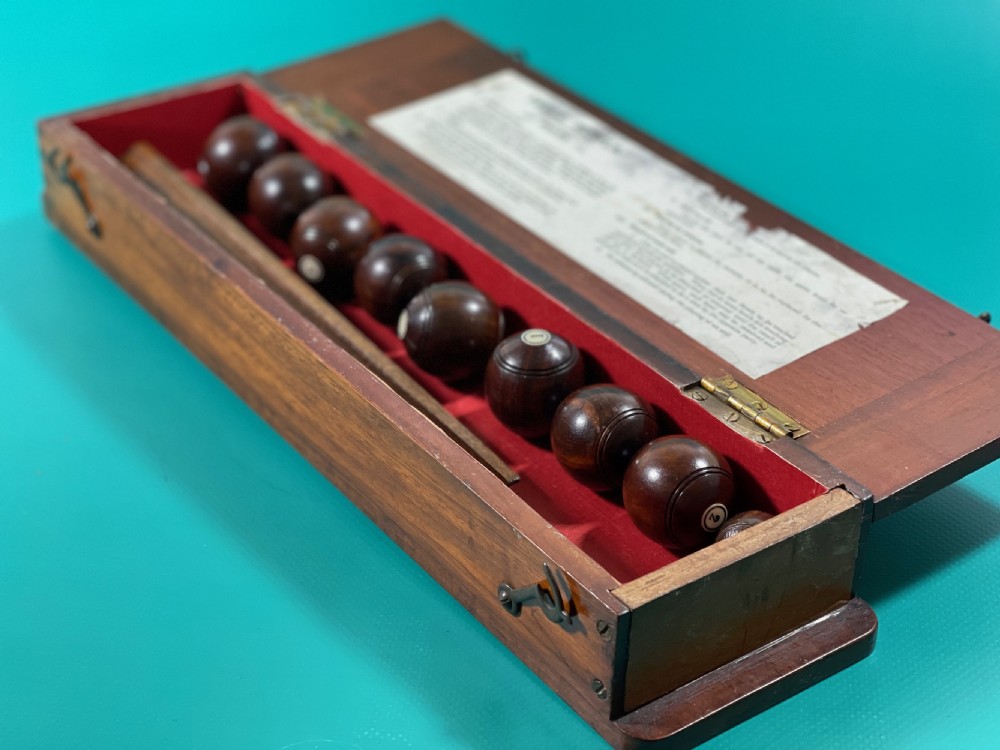 Antique treen Table bowls in a Mahogany Box - complete with rules View VI