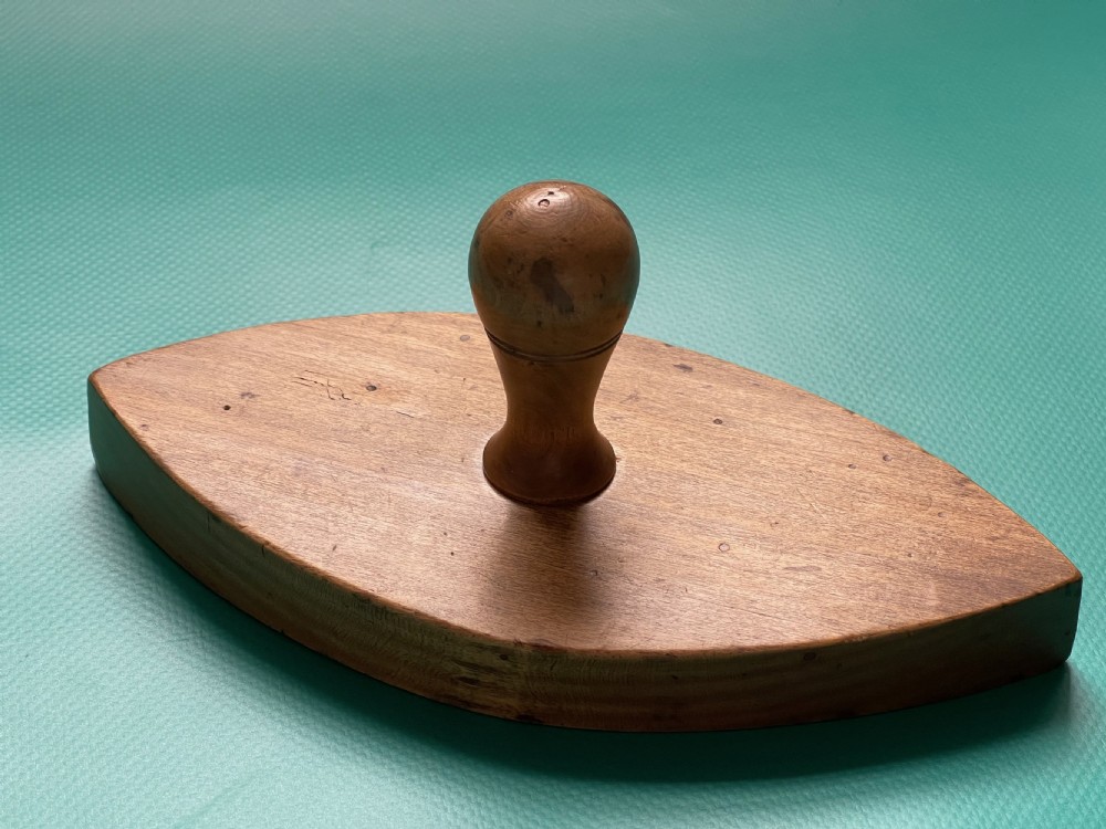 Antique Welsh sycamore canoe shaped butter stamp View II