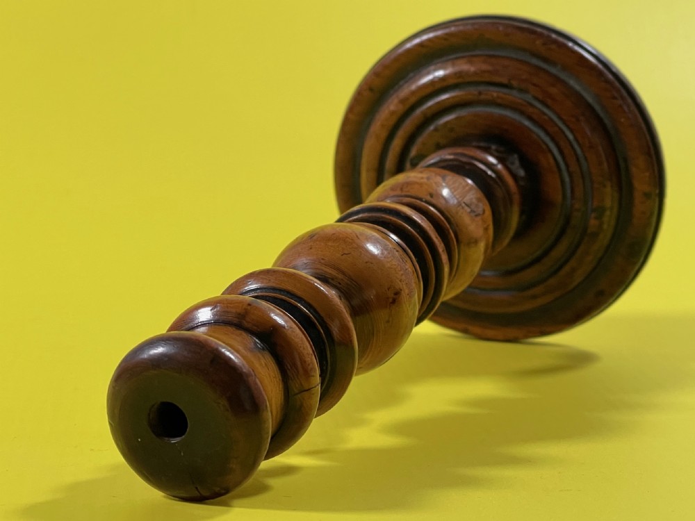 A 19th century antique treen  fruit wood candle stick  View II