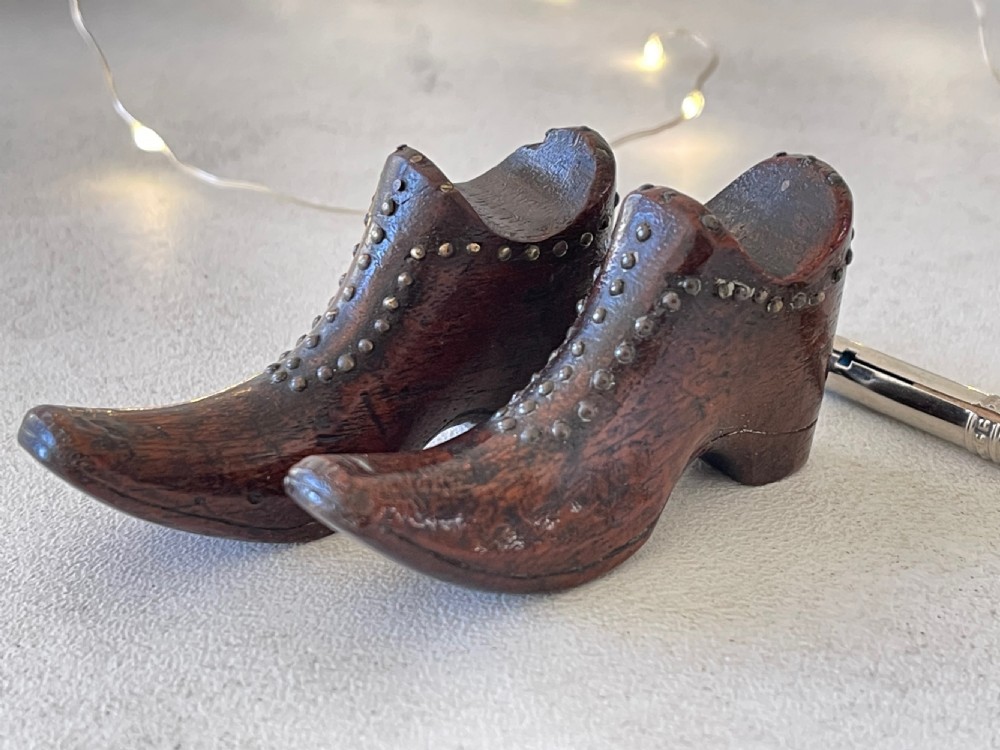 A Pair of Antique Treen Pen Rests