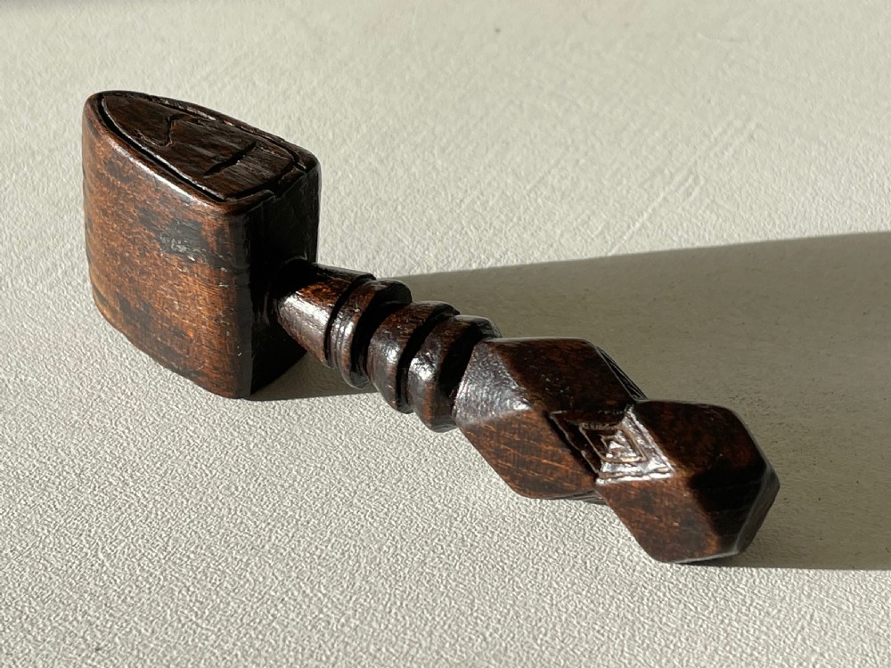 An Antique Treen Folk Art sailors seam rubber View V