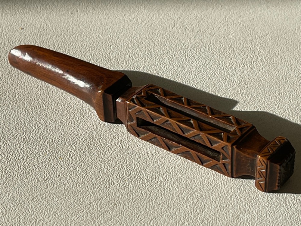 An Unusual Antique Treen Apple Corer