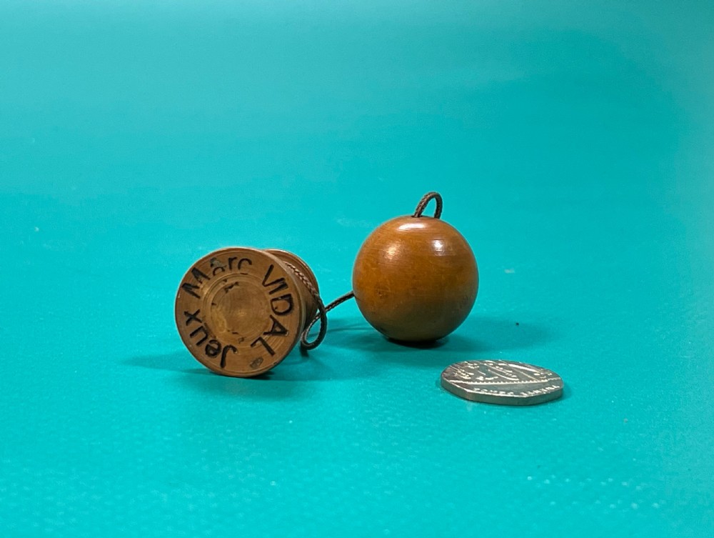 A Mini Antique Treen Bilboquet View III