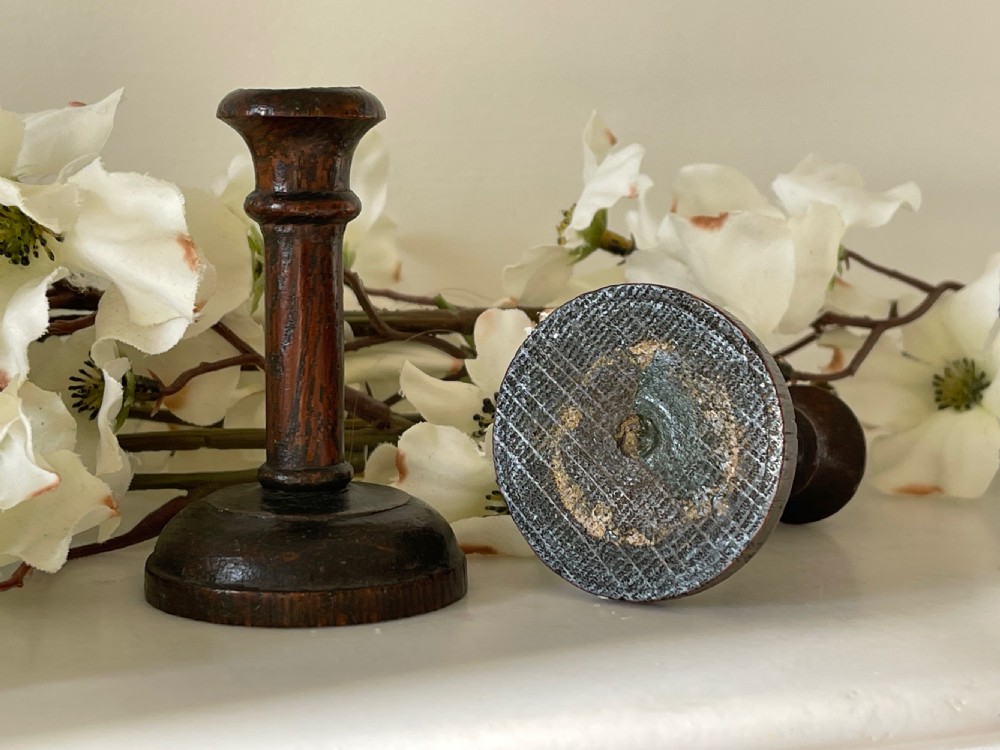 A Pair Of Antique Treen Taper Candlesticks View III